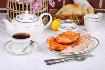 Smoked chicken with lemon tea on a white background