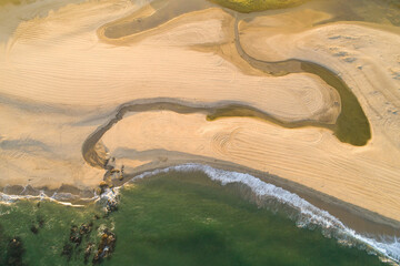 aerial view of a sunset beach