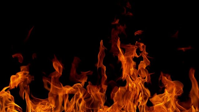 Super slow motion of fire flames isolated on black background. Filmed on high speed cinema camera at 1000 fps