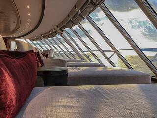 Luxurious elegant bar, lounge or coffee shop in cozy living room interior design with sofas, arm...