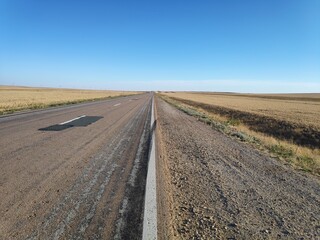 Fototapeta na wymiar road in the steppe