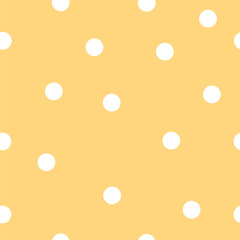 Seamless pattern with white polka dots on yellow background. Vector.