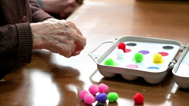Rehabilitation center. Brain therapy cognitive psychological testing on senior patient. Alzheimer's disease and dementia prevention concept. Adaptation skills recovery. High quality 4k footage.