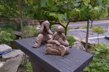 Asian pottery curated with green nature, traditional pottery work symbolizing two people
