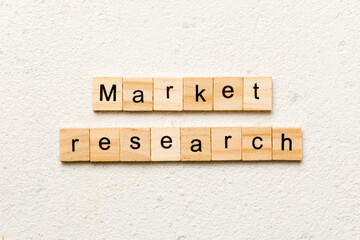 Market Research word written on wood block. Market Research text on cement table for your desing, concept