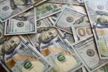 Texture of dollar bills. One hundred dollars. Close-up.