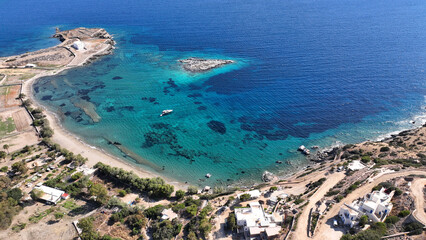 Aerial drone photo of paradise beach of Tsigouri and heart shaped small islet of Plaka, Schoinousa, Small Cyclades, Greece - obrazy, fototapety, plakaty