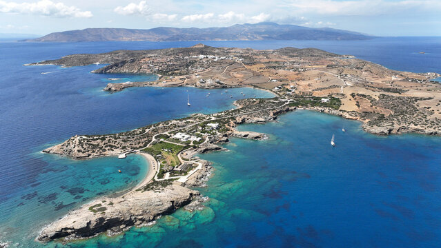 Aerial drone photo of paradise secluded beach of Agios Vasileios located in long peninsula of small island of Schoinousa, Small Cyclades, Greece