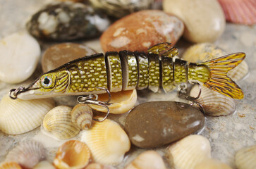 One artificial spinning lure. Close-up.