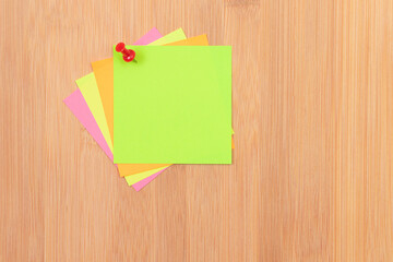 Colored Sticky Notes with Copyspace Pinned to the Wooden Message Board. To Do List Reminder in Office. Blank Memo Sticker at Work - Template. Empty Checklist - Mockup