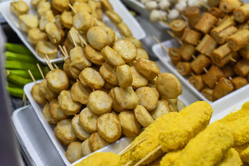 Many snacks and seafood in vietnamese night market in food festival