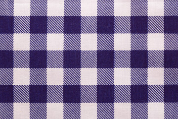 Close-up plaid fabric pattern texture and textile background.