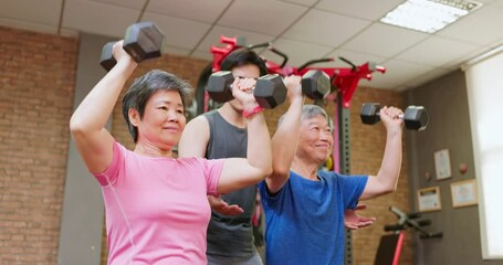 Asian elderly sports in gym