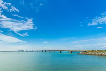 Fotobehang Atlantische weg Ile de Ré bridge seen from La Rochelle shore on a sunny day in Charente-Maritime, France