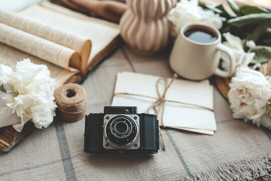 retro photo camera with book and vintage letters