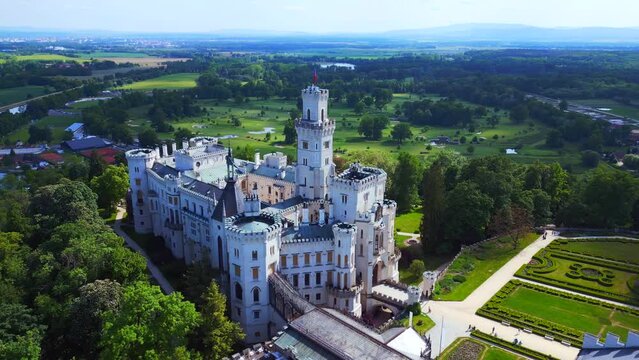 white Fairy tale Castle in Czech Republic. Perfect aerial top view flight drone