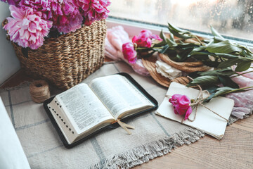 Open bible in home morning interior