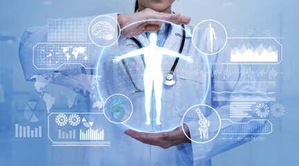 Doctor holding hologram of a human body with human organs in concept of health. Medical future technology and innovative.