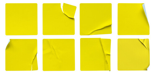A set of yellow square paper sticker label isolated on white background.