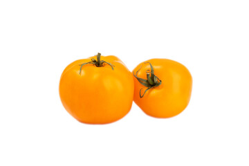 Yellow tomato isolated on white background. Fresh yellow tomatoes. Fresh vegetables. Vegan. Close-up. Healthy food. Salad Ingredients.
