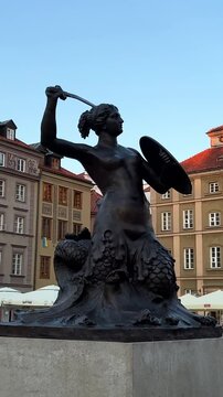 The Old Square in the center of the city of Warsaw is called the market square in the center of it is the symbol of Warshaw the mermaid. High quality 4k footage 23.06.2022 Poland
