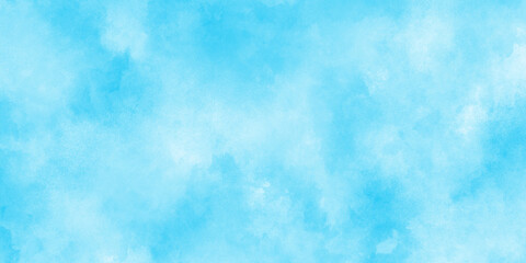 Defocused and blurry wet ink effect sky blue color watercolor background, blurred and grainy Blue powder explosion on white background, Classic hand painted Blue watercolor background for design.	