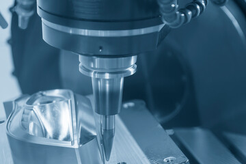The CNC milling machine cutting injection mold part by solid barrel  tool.