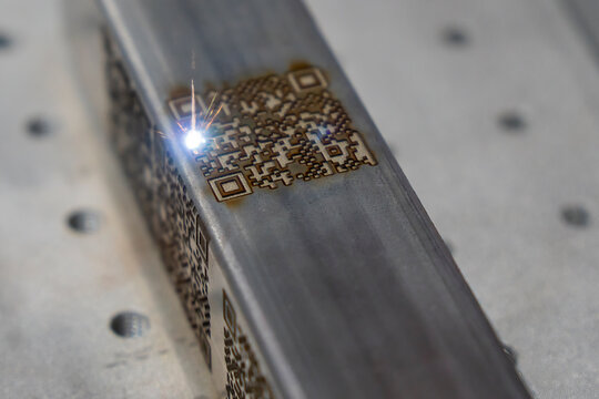The barcode on square metal  pipe from etching machine.
