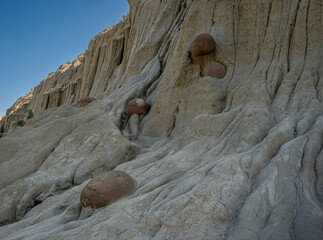 Cannonball Concretions at the badlands of the North Unit of Theodore Roosevelt National Park  - obrazy, fototapety, plakaty