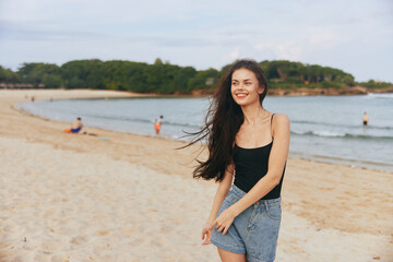 Fototapeta premium woman smile smiling sea summer lifestyle vacation sunset ocean beach sand