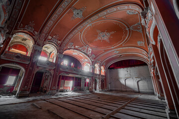 Obraz premium Exploring the Historic Abandoned Red Cinema and Abandoned Red Theatre in Miskolc, HungaryJourney Through Time and Culture