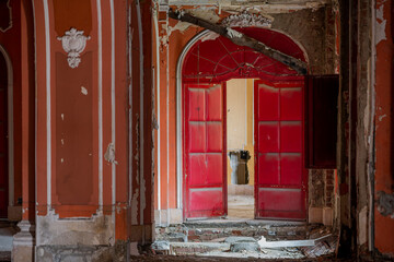 Fototapeta na wymiar Exploring the Historic Abandoned Red Cinema and Abandoned Red Theatre in Miskolc, HungaryJourney Through Time and Culture