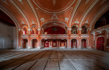 Obraz premium Exploring the Historic Abandoned Red Cinema and Abandoned Red Theatre in Miskolc, HungaryJourney Through Time and Culture