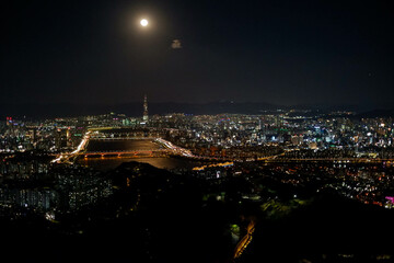 Busan city night view and skyscrapers taken from hwangnyeongsan