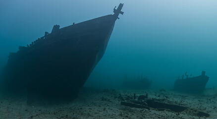 amazing sunken ship under the sea surface with good lighting in high resolution
