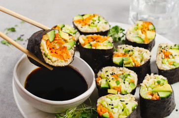 Vegan Sushi Rolls with Fresh Vegetables and Quinoa, Tasty Vegetarian Meal