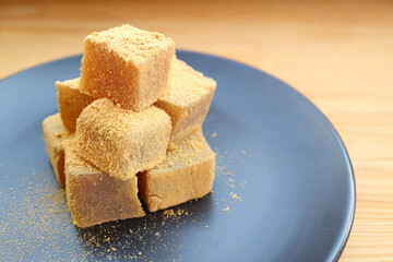 Closeup of Warabimochi, a Tasty Japanese Traditional Confection Covered with Kinako Flour