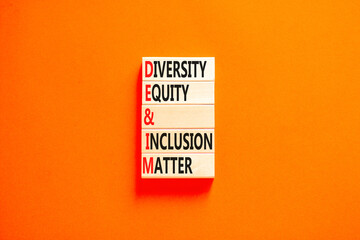 DEI Diversity equity inclusion matter symbol. Concept words DEI diversity equity and inclusion matter on wood block. Beautiful orange background. Business diversity equity inclusion matter concept