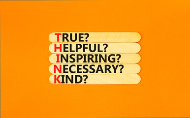 Think symbol. Concept words Think before you speak true helpful inspiring necessary kind on wooden stick. Beautiful orange background. Business Think true helpful inspiring necessary kind concept.