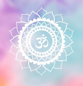 White mandala with om symbol on colorful background, Chakra symbol and decorative element.