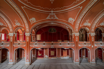 Obraz premium Exploring the Historic Abandoned Red Cinema and Abandoned Red Theatre in Miskolc, HungaryJourney Through Time and Culture