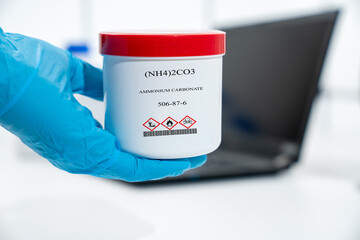 (NH4)2CO3 ammonium carbonate CAS 506-87-6 chemical substance in white plastic laboratory packaging