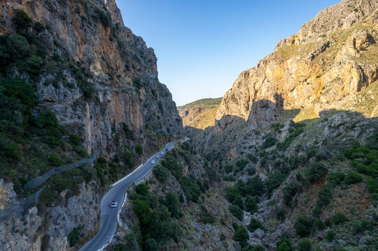 Aerial summer sunny view of serpentine mountain road near Topolia Gorge, Crete, Greece