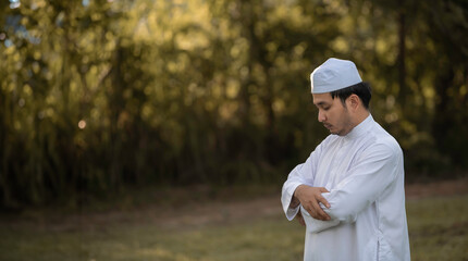 Asian islam man prayer,Young Muslim praying,Ramadan festival concept