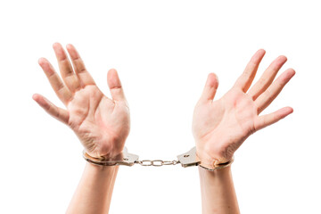 Male hands on a white background close-up in metal handcuffs