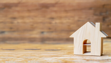 Obraz na płótnie Canvas wood house model for real estate property buy sale concept