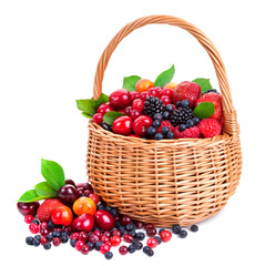 Fresh berries in basket isolated on white background with clipping path