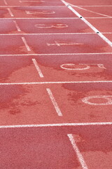 Synthetic running track for sporting events