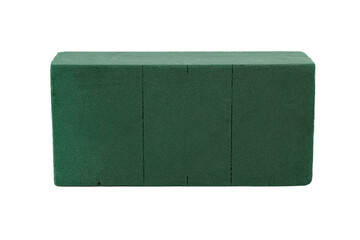 Green colored floral foam isolated white background.