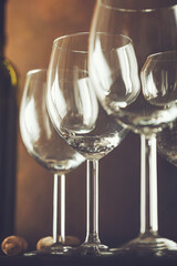 Wine. Empty wine glass. in wine cellar. Old white wine on wood.Arranged wine glasses